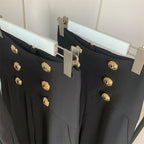 High waist pants with gold buttons